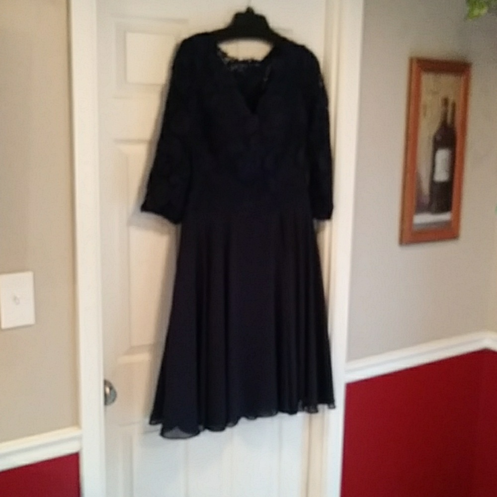 Navy blue lace v necked top with built in corsett